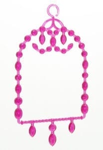 A pink necklace with a crown on it